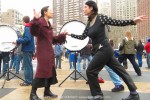 Sandra Chinn and Julie Lemberger, childhood friends greet each other with a dance